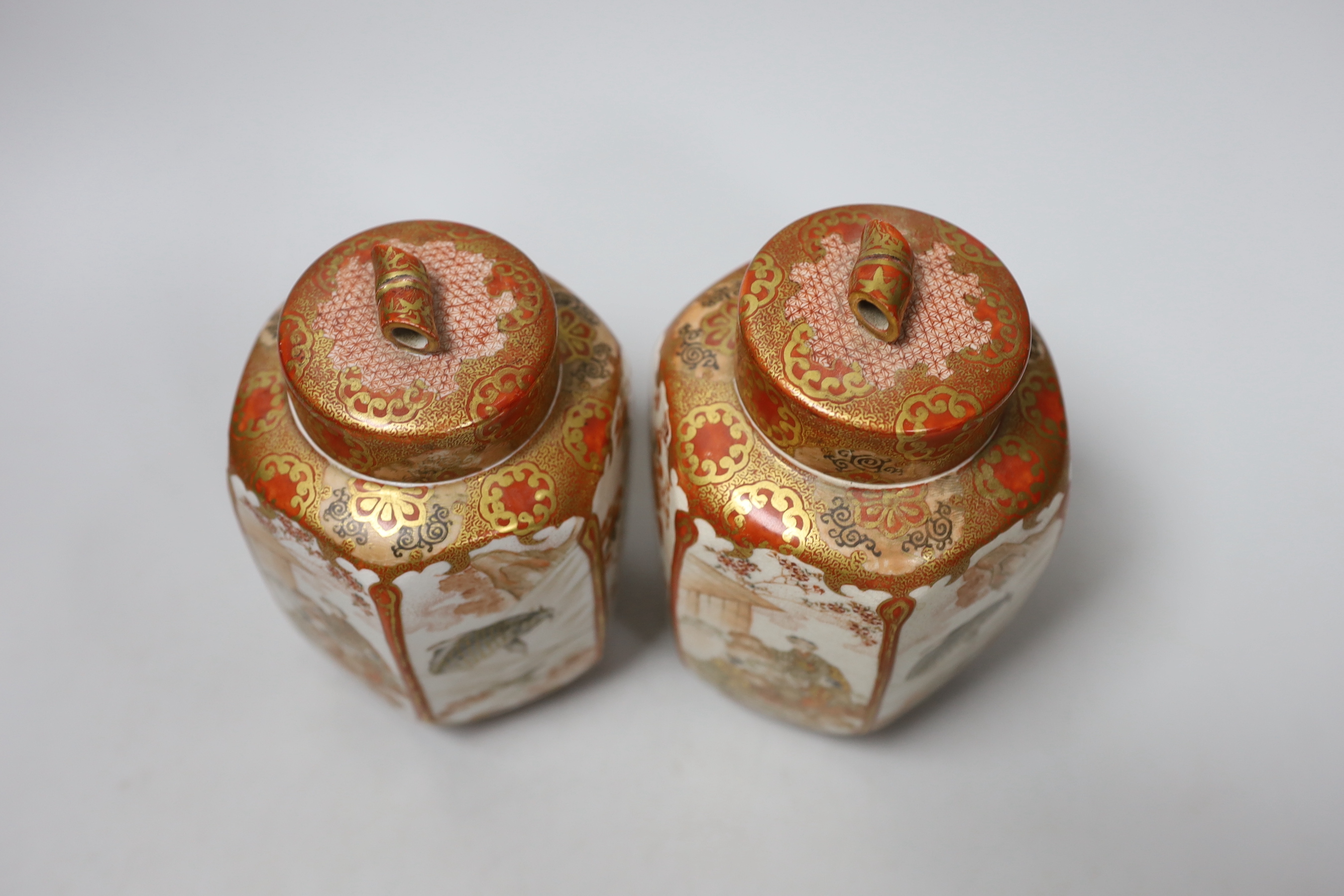 A pair of Meiji period Kutani hexagonal jars and covers, with inner and outer covers, 14cm high